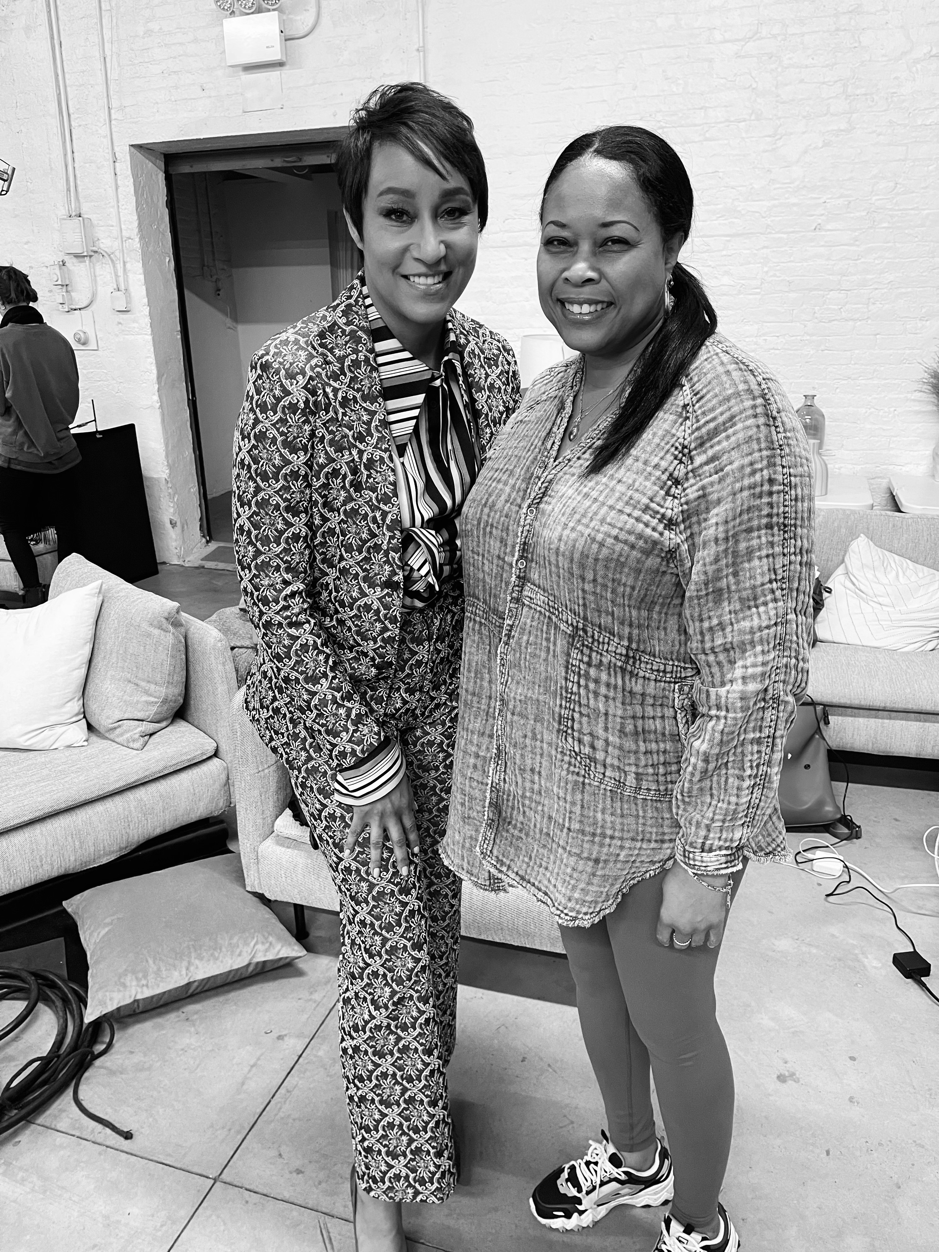 With on-camera talent between takes